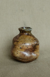 Soda fired slip bud vase